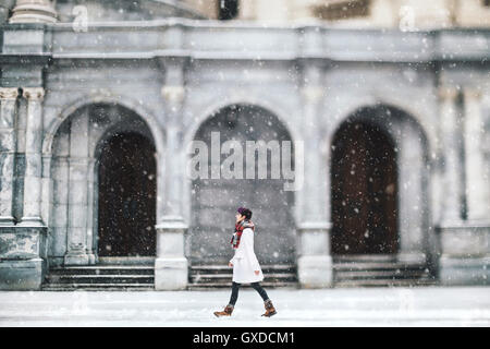 Young woman in front of the Christian Science Centre, Boston, Massachusetts, USA Stock Photo