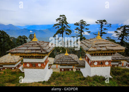 View of Dochula Pass, on the way from Thimphu to Punaka, overlooking the Himalayas, is a concentration of 108 chortens (stupas) Stock Photo