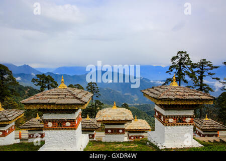 View of Dochula Pass, on the way from Thimphu to Punaka, overlooking the Himalayas, is a concentration of 108 chortens (stupas) Stock Photo