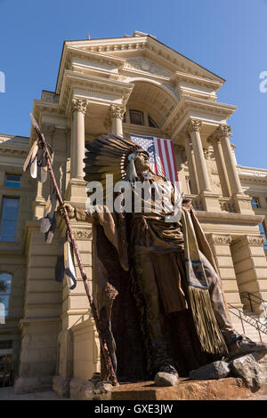 Statue of Chief Washakie of the Shoshone tribe at the Wyoming State Capitol Building in Cheyenne, Wyoming. Chief Washakie was a famed Native American warrior and instrumental in establishing peace between Indians and settlers in Wyoming. Stock Photo