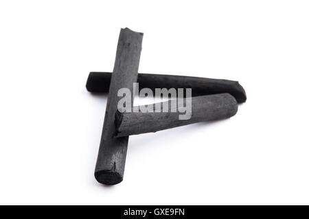 Artist's black charcoal isolated on white Stock Photo