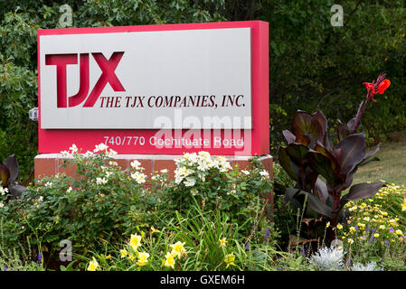 A logo sign outside of the headquarters of The TJX Companies, Inc., in Framingham, Massachusetts on August 13, 2016. Stock Photo