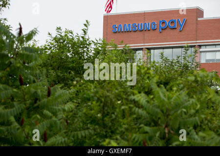 A logo sign outside of the headquarters of Samsung Pay in Burlington, Massachusetts on August 13, 2016. Stock Photo