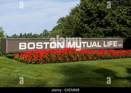 A logo sign outside of the headquarters of the Boston Mutual Life Insurance Company in Canton, Massachusetts on August 14, 2016. Stock Photo