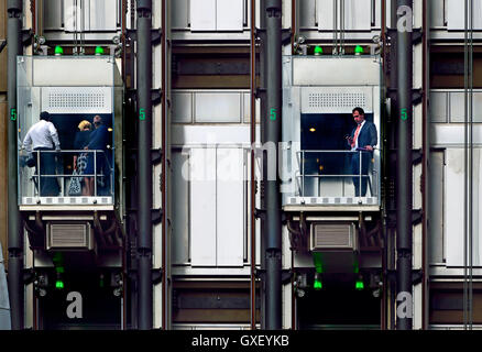 London, England, UK. Glass lifts in Lloyd's Insurance building in the City. Stock Photo