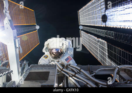 International Space Station Expedition 48 crew member NASA astronaut Kate Rubins works on the station exterior during a 6 hour and 48 minute spacewalk with Commander Jeff Williams September 1, 2016. Stock Photo