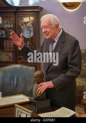 Former U.S. President Jimmy Carter accepts the LBJ Foundation award at The Carter Center January 13, 2016 in Atlanta, Georgia. The LBJ Liberty and Justice for All Award recognizes leadership in public service. Stock Photo