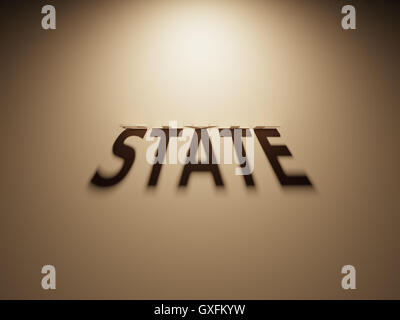 A 3D Rendering of the Shadow of an upside down text that reads State. Stock Photo