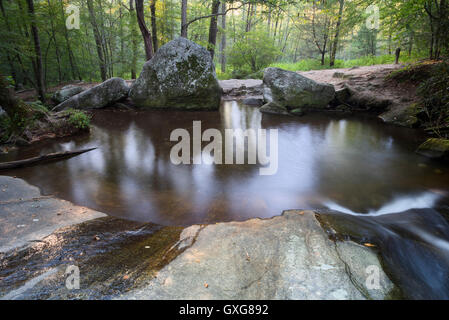 Stone Mountain State Park. Roaring Gap North Carolina. Pool at the base of Widows Creek Falls. waterfall Stock Photo