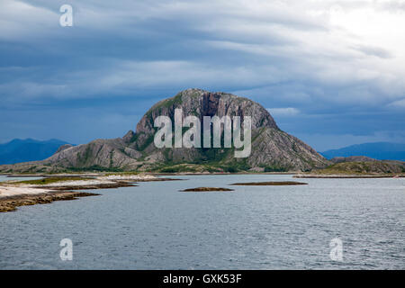 Torghatten granite mountain with a hole through it, Torget island, Brønnøy, Nordland county, Norway Stock Photo