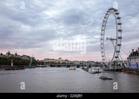 London, 12 September 2016. A sunset over river Themes in a cloudy day seen from Westminster Bride. Stock Photo