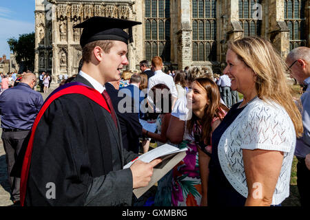 Families At The Canterbury Christ Church University's Graduation Ceremony, Canterbury Cathedral, Canterbury, Kent, UK Stock Photo