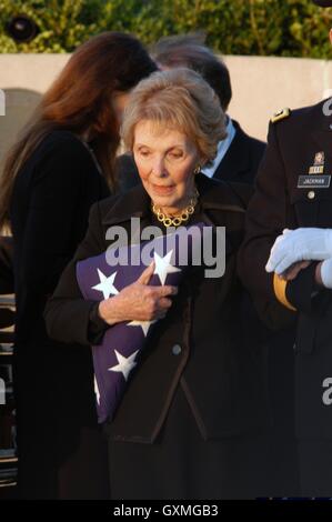 Former First Lady Nancy Reagan says her final goodbye to husband former U.S. President Ronald Reagan during interment services held at the Ronald Reagan Presidential Library June 11, 2004 in Simi Valley, California. Stock Photo