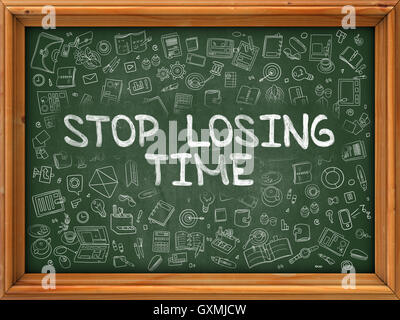 Stop Losing Time - Hand Drawn on Green Chalkboard. Stock Photo