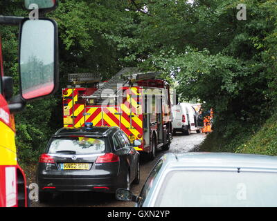 Fire engines parked in narrow lane attending for the rescue of London bound train's derailment at Hunton Bridge tunnel. Taken in Gypsy Lane, Hunton Bridge near Watford.