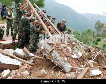 Quanzhou, China's Fujian Province. 16th Sep, 2016. Rescuers search for survivors at a landslide area in Nan'an, southeast China's Fujian Province, Sept. 16, 2016. Disaster relief and reconstruction were launched after Typhoon Meranti swept away and left severe damages. Credit:  Jiang Kehong/Xinhua/Alamy Live News Stock Photo