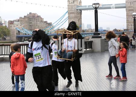 The Great Gorilla Run now in its 14th year, is a charity fun run that has raised well over £2 million for gorilla conservation and poverty reduction projects in central Africa.   Hundreds of people dressed as gorillas run, jog or walk 8km though the City of London, raising money to help save a species on the edge of extinction. Stock Photo