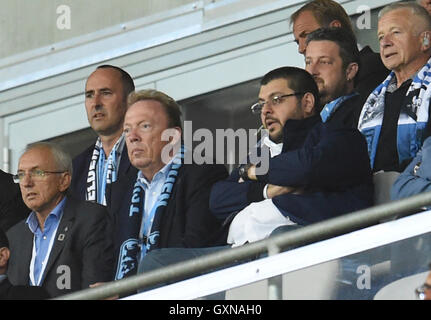 1860 Munich's president Peter Cassalette (C-L) and Jordanian investor Hasan Ismaik (C-R) watch the match from the viewing stands during the German 2nd division Bundesliga soccer match between TSV 1860 Munich and FC Union Berlin in the Allianz Arena in Munich, Germany, 16 September 2016. Photo: Tobias Hase/dpa Stock Photo
