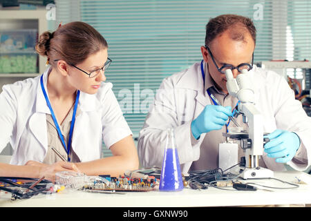 Scientists working in a chemical lab Stock Photo