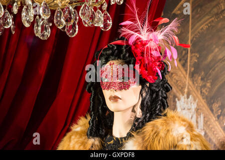 A lady's clothes shop window display as part of the Munich Christmas Market in Munich, Germany Stock Photo