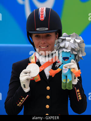 Great Britain's Sophie Wells with the silver medal after the Dressage ...