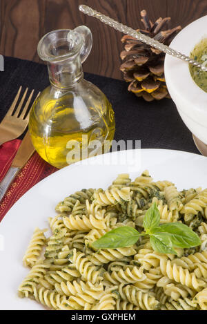 Traditional Italian pasta  Fusili served with pesto sauce Stock Photo