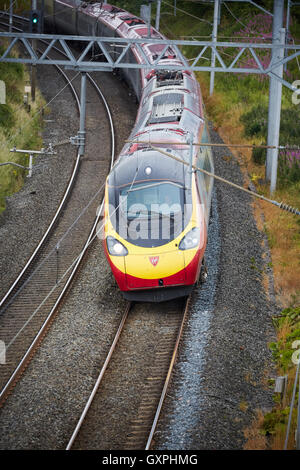 Carlisle railway train Pendolino  Carlisle, Cumbria virgin Alstom Class 390 Pendolino West Coast Main Line (WCML) franchise head Stock Photo