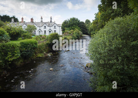 Victorian miners' cottages on the Duke of Bedford's estate, Tavistock, Devon, overlooking the River Tavy. Stock Photo