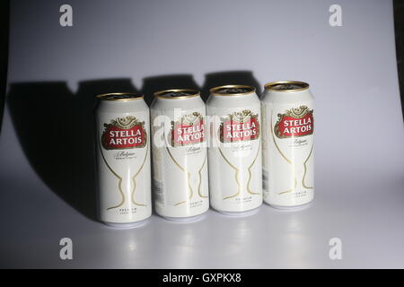 Four cans of Stella Artois lager Stock Photo