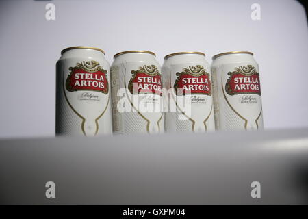 Four cans of Stella Artois lager Stock Photo