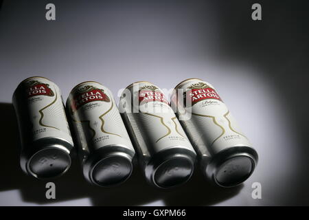 Four cans of Stella Artois lager Stock Photo