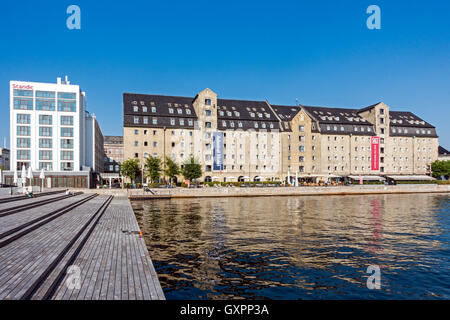 Kvæsthusbroen wharf in Copenhagen Denmark with Scandic Hotel Front and Copenhagen Admiral Hotel  Larsens Plads in Copenhagen Stock Photo