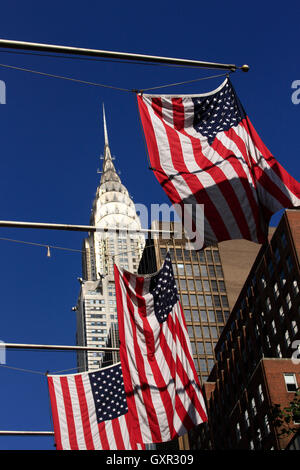 American flags in New York City and Chrysler Building Stock Photo