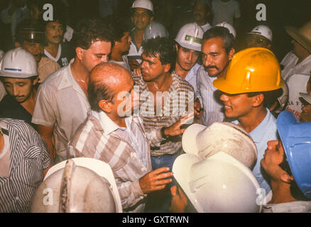 CIUDAD GUAYANA, VENEZUELA - Presidential candidate Carlos Andres Perez campaigning, meeting hard hat workers at SIDOR factory in October 1988. Stock Photo