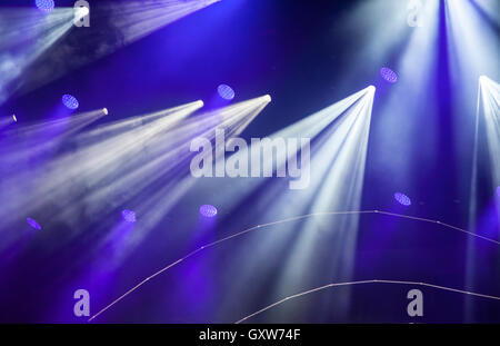 Stage lights on electric concert on blue background Stock Photo