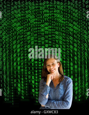 Nerd computer businesswoman on matrix binary background Stock Photo