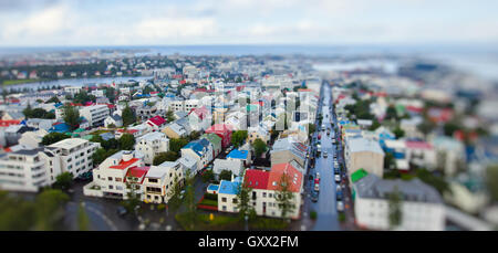 Beautiful super wide-angle aerial view of Reykjavik, Iceland with harbor and skyline mountains and scenery beyond the city, seen Stock Photo