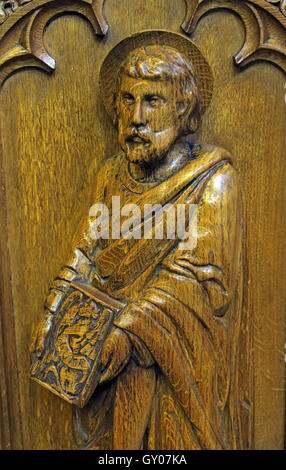St Wilfrids Church Grappenhall- Pulpit wood carving of apostle, Warrington Stock Photo