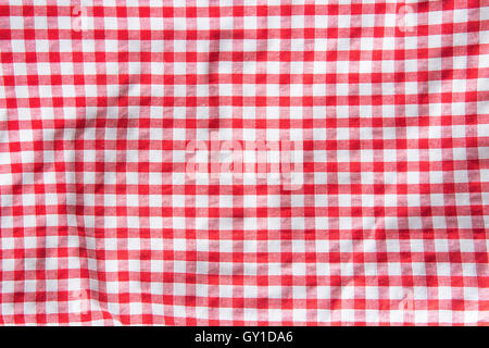 The crumpled checkered tablecloth background. Top view. Stock Photo