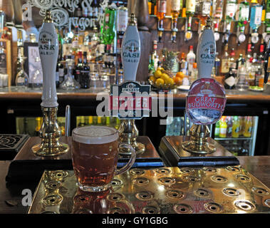 Traditional Pint of bitter on the bar, at the George & Dragon pub, Great Budworth Village, Cheshire, England Stock Photo