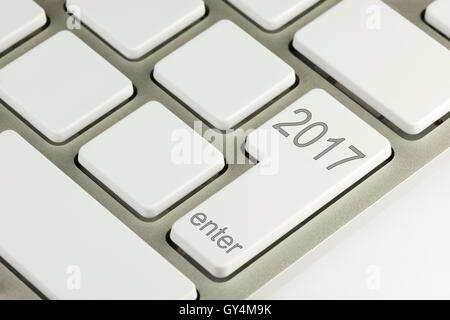 Metal keyboard with white keys and two thousand seventeen on the enter button Stock Photo
