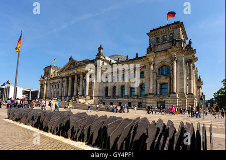 Berlin, Germany. The Reichstag building was opened in 1894 and closed in 1933 after a severe fire. After restoration it has after 1999 again been a meeting place for the German Parliament, the Bundestag. Stock Photo