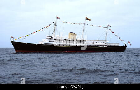 AJAXNETPHOTO. JULY, 1991. MILFORD HAVEN, WALES. - DRESSED OVERALL -  HMRY BRITANNIA AT MILFORD HAVEN FOR THE TALL SHIPS REGATTA. PHOTO:JONATHAN EASTLAND/AJAX REF:920345 Stock Photo