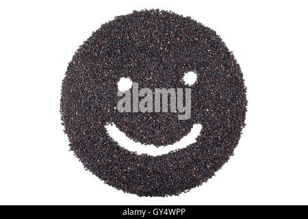 black sesame in smile face isolated on white background Stock Photo