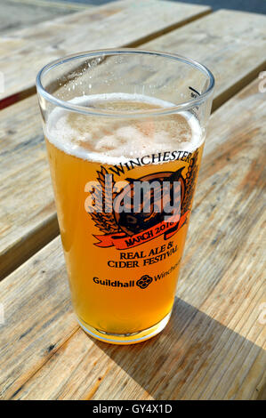 A pint of unfined India pale ale (IPA) in the sunshine. Stock Photo
