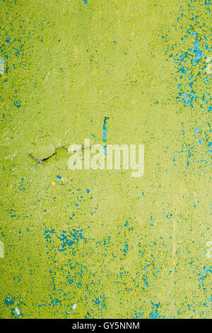 Close View Of Multilayer Dyed And Cracked Flaked Texture Of Blue And Light Green Paint At  The Surface. Stock Photo