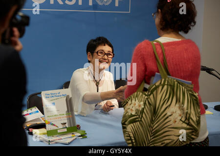 New York, United States. 16th Sep, 2016. Author Seiko Takase, signs books and greeted guest at the UN Book Store on the International Day of Peace. Seiko Takase shares with us her father Chiyoji Nakagawa project known as the “Peace Bell” on the 35th Anniversary of the International Day of Peace. Credit:  Mark J Sullivan/Pacific Press/Alamy Live News Stock Photo