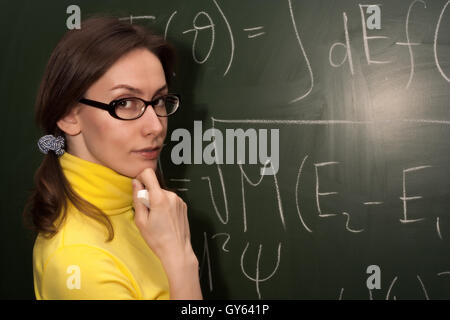 Portrait of an attractive beautiful pretty cute young brown haired caucasian woman (lady, girl, female, person, model) teacher Stock Photo