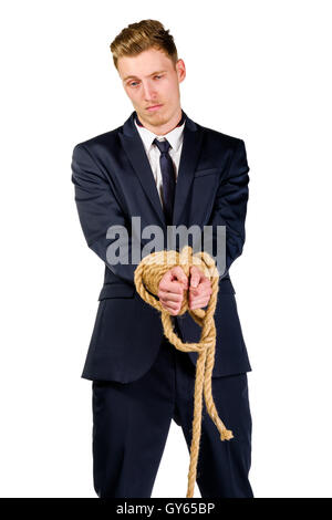Young businessman in a suit tied up Stock Photo