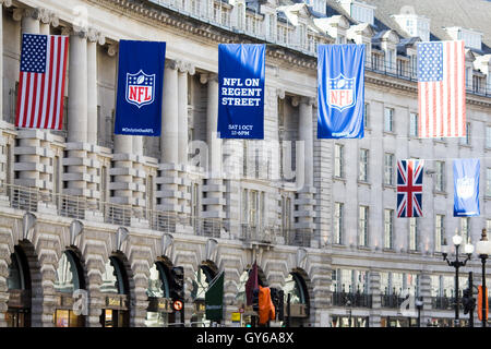 flags flying in regent street for  The NFL coming to London England Stock Photo
